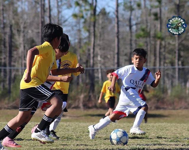 Partido infantil en la Louisiana Bayou Cup